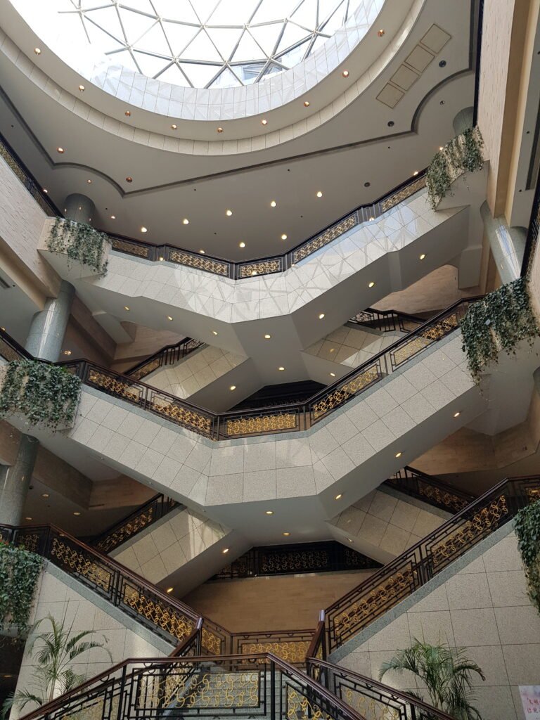 Looking up at the staircase inside Shanghai Museum in May 2019
