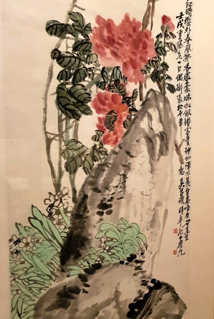 Loose, expressive hanging scroll painting of peony and narcissus by Qing dynasty artist Wu Junqing exhibited in the Painting Gallery at Shanghai Museum in May 2019
