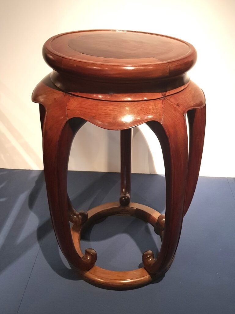 A Ming dynasty (1368 - 1644 CE) incense stand made from Huanghuali wood, as seen exhibited in the Shanghai Museum in May 2019