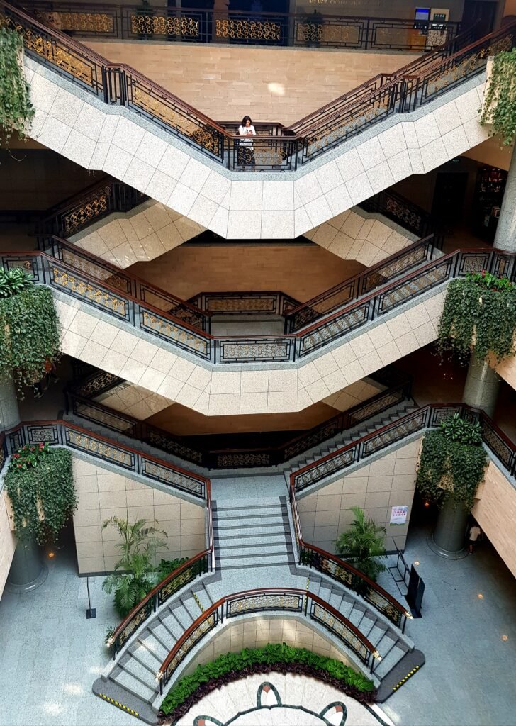 The magnificent staircase inside Shanghai Museum, viewed from the top floor looking down