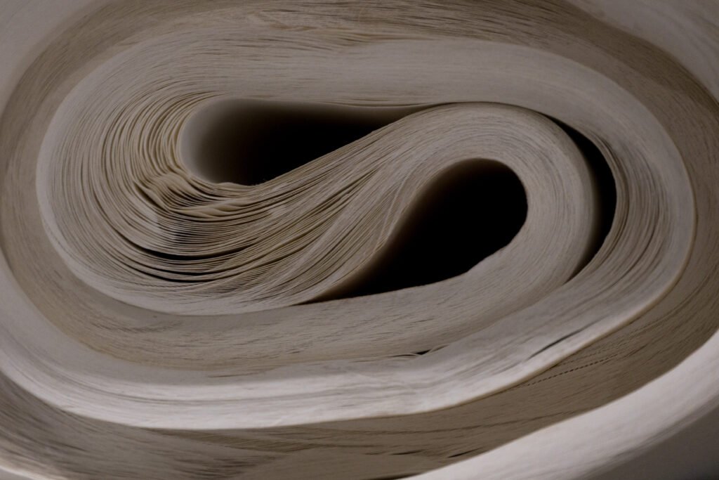 A close-up of a roll of Chinese Xuan paper viewed end-on