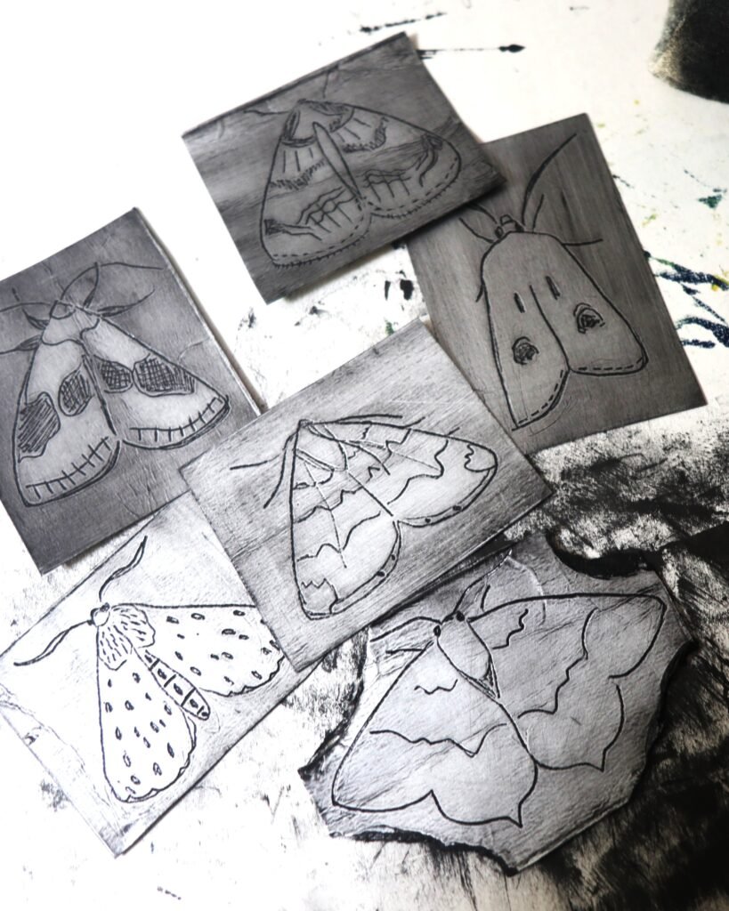 A few inked Moth design Tetra Pak plates